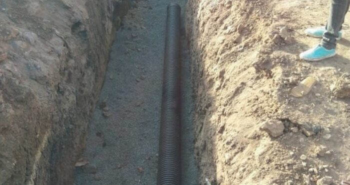 Pipe laying for road crossing